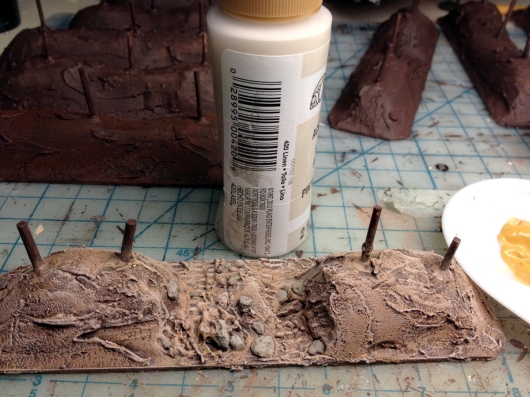 Finally, do a light drybrush of a light tan color. This one is called "Linen," and it's somewhat close to Vallejo's Iraqi Sand. When I say 'light" drybrush, remember we're painting terrain here, not some twelve dollar 32mm miniature. Do it quick and don't sweat if it's a little heavy (or light).