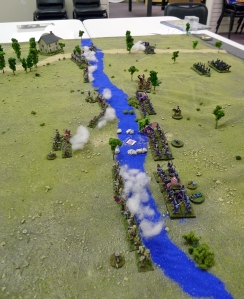 This river should be running red by now, rather than cerulean blue. Way off in the distance, you can see that blocking Union regiment giving my cavalry a fierce volley.