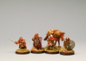 The wee folk, plus Gus the mule. The humanoids are all Red Box minis. The pack mule is a Warlord figure from their ancient Romans line. They use Pilum in fantasy settings, right?! I need more halflings in my collection.